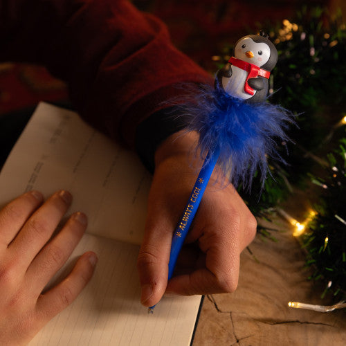 Light Up Christmas Penguin Gel Pen by legami at penny black showing being used