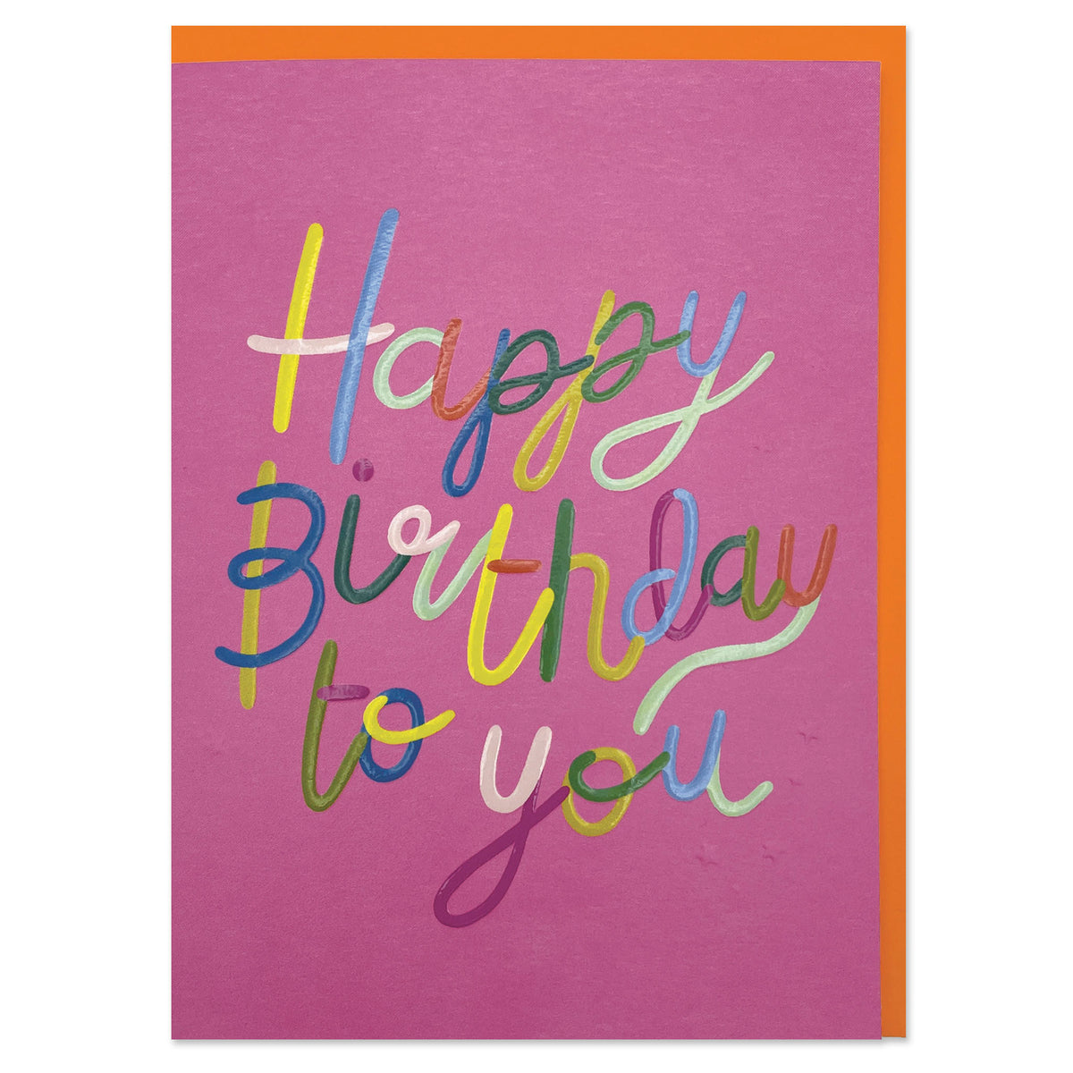 A colourful greetings card to celebrate a birthday where the main colour is hot pink. The wording on the card is &#39;Happy Birthday to you&#39; in big cursive style wrting. Each part of each letter is a different colour.