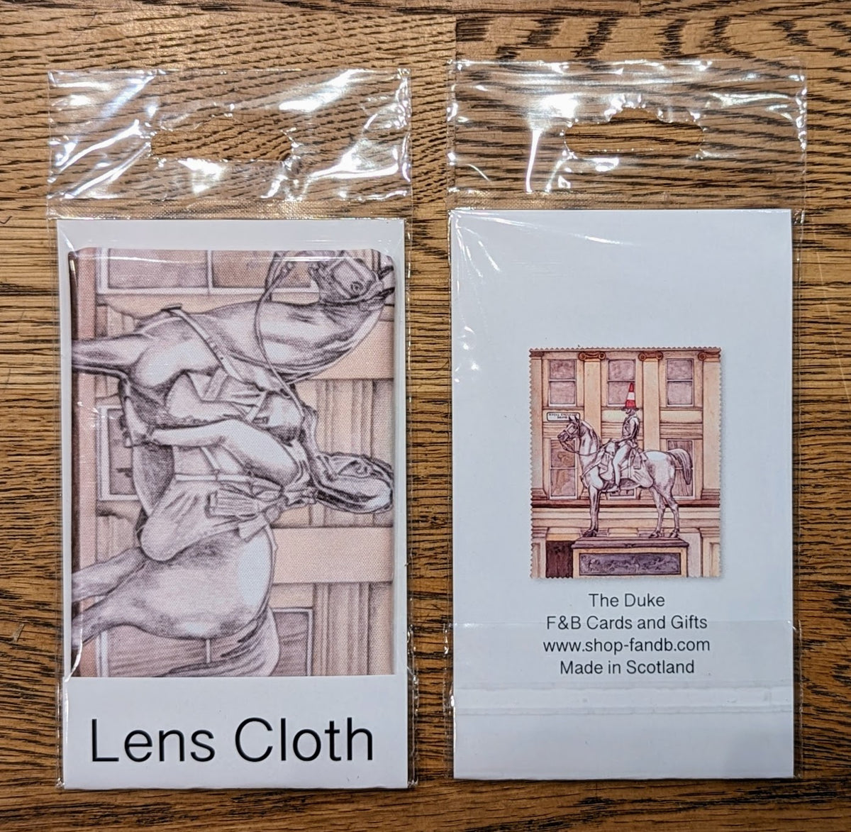 Glasgow Duke Of Wellington Lens Cleaning Cloth By Penny Black showing packaging