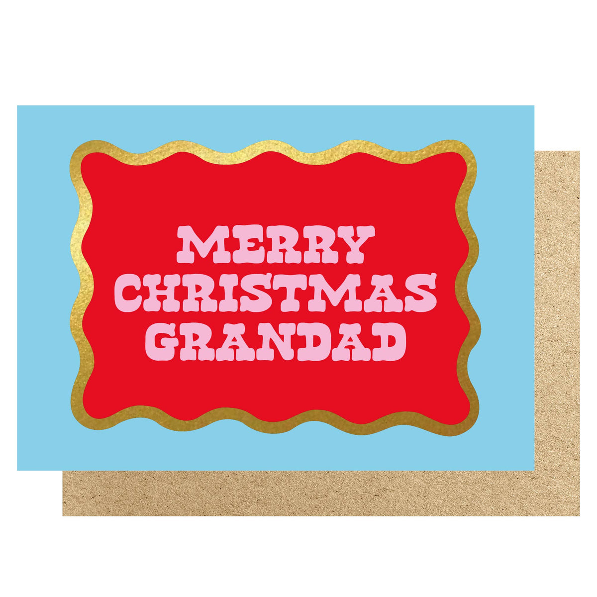 A christmas greeting card with a light blue background, a large red central panel with wavy gold edges, and the text “MERRY CHRISTMAS GRANDAD” in white. A kraft paper envelope is visible behind the card.