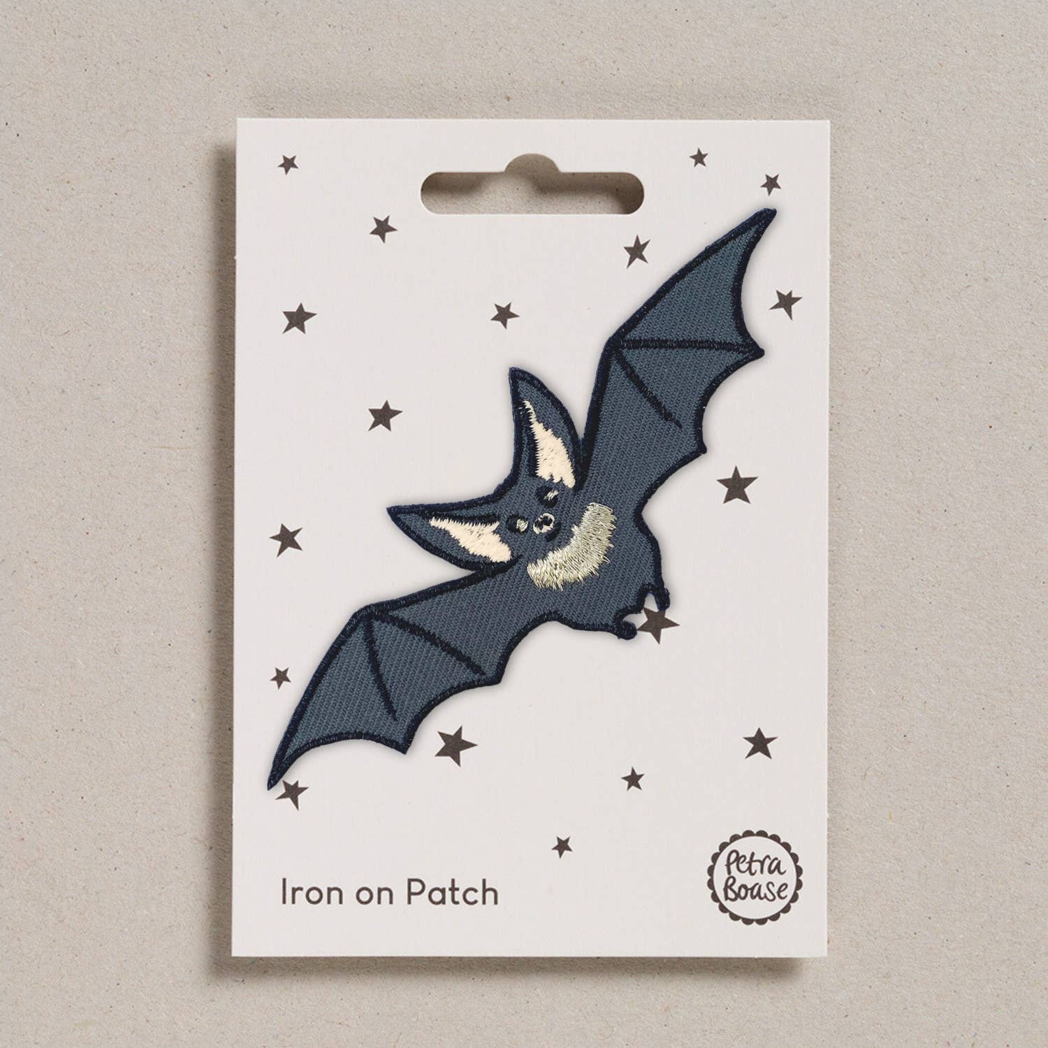 Colourful Iron on Patch - Bat shown on backing card at penny black