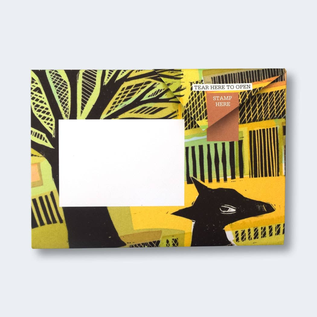 Rewilding Pigeon Folding Letter Set by penny black - showing a folded letter with artwork showing a dog in nature