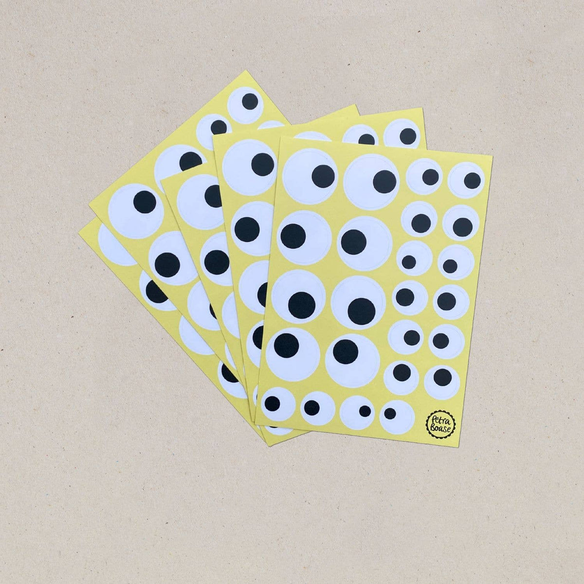 Googly Eyes Waterproof Stickers 5 Sheet Pack shown out of packaging by penny black