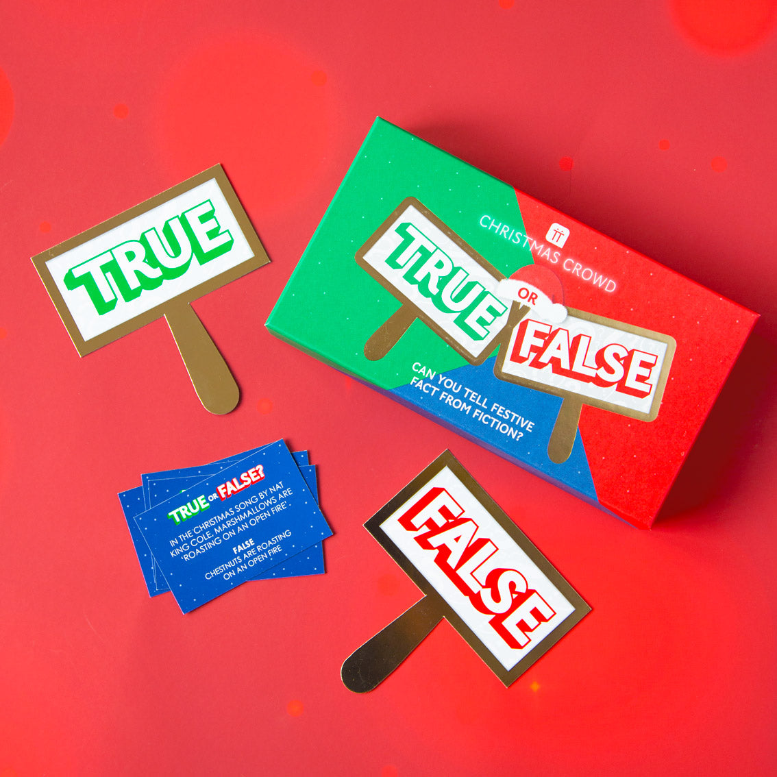 An image of the contents of the boardgame True or False, showing paddles.