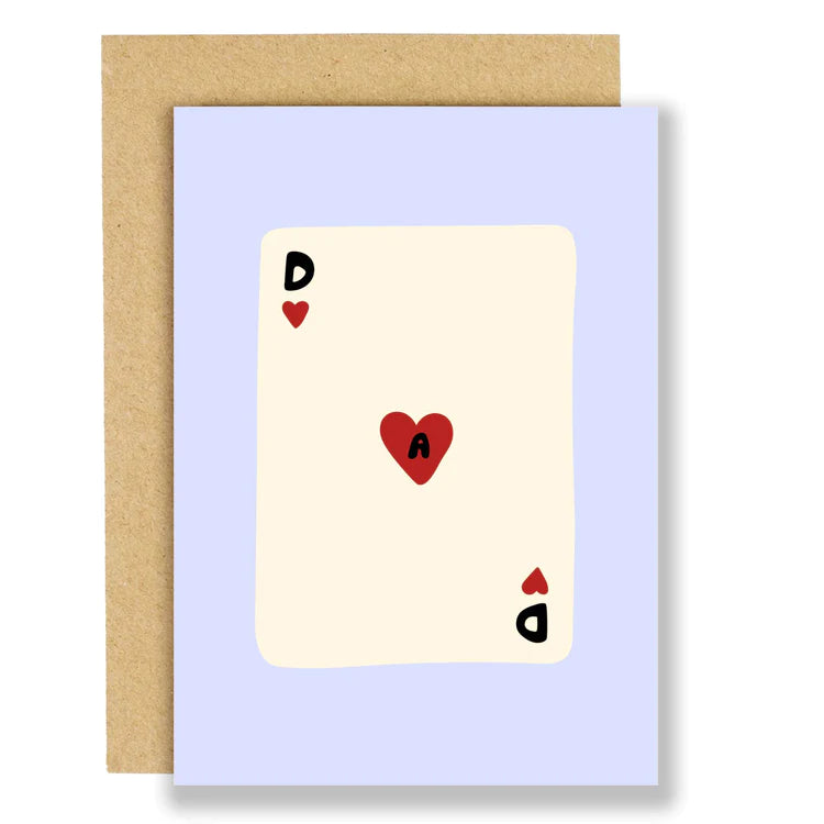 A greetings card with a lilac background with a large cream colour illustrated playing card in the middle. The playing card is like an ace of hearts with the letters D-A-D diagonally across the playing card.