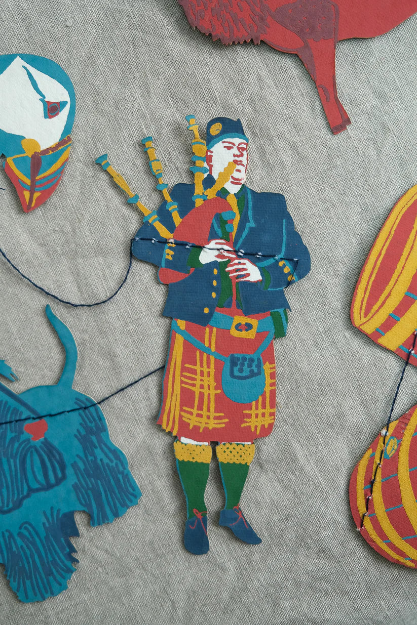 Scottish Icons Paper Garland - Bagpiper by east end press at penny black
