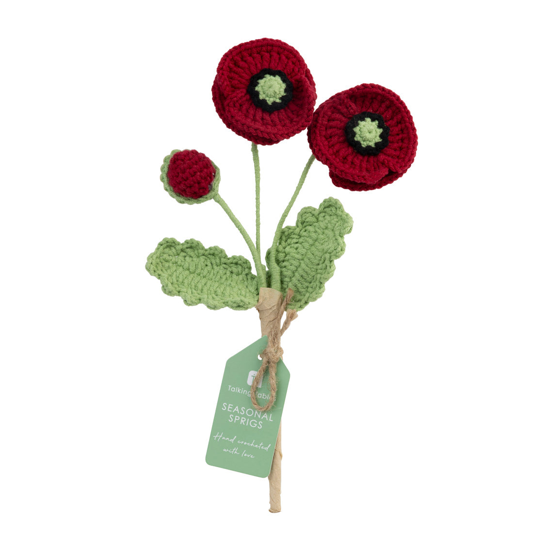 Crocheted red poppies with a green stalk with a tag on a white background  by talking tables at penny black