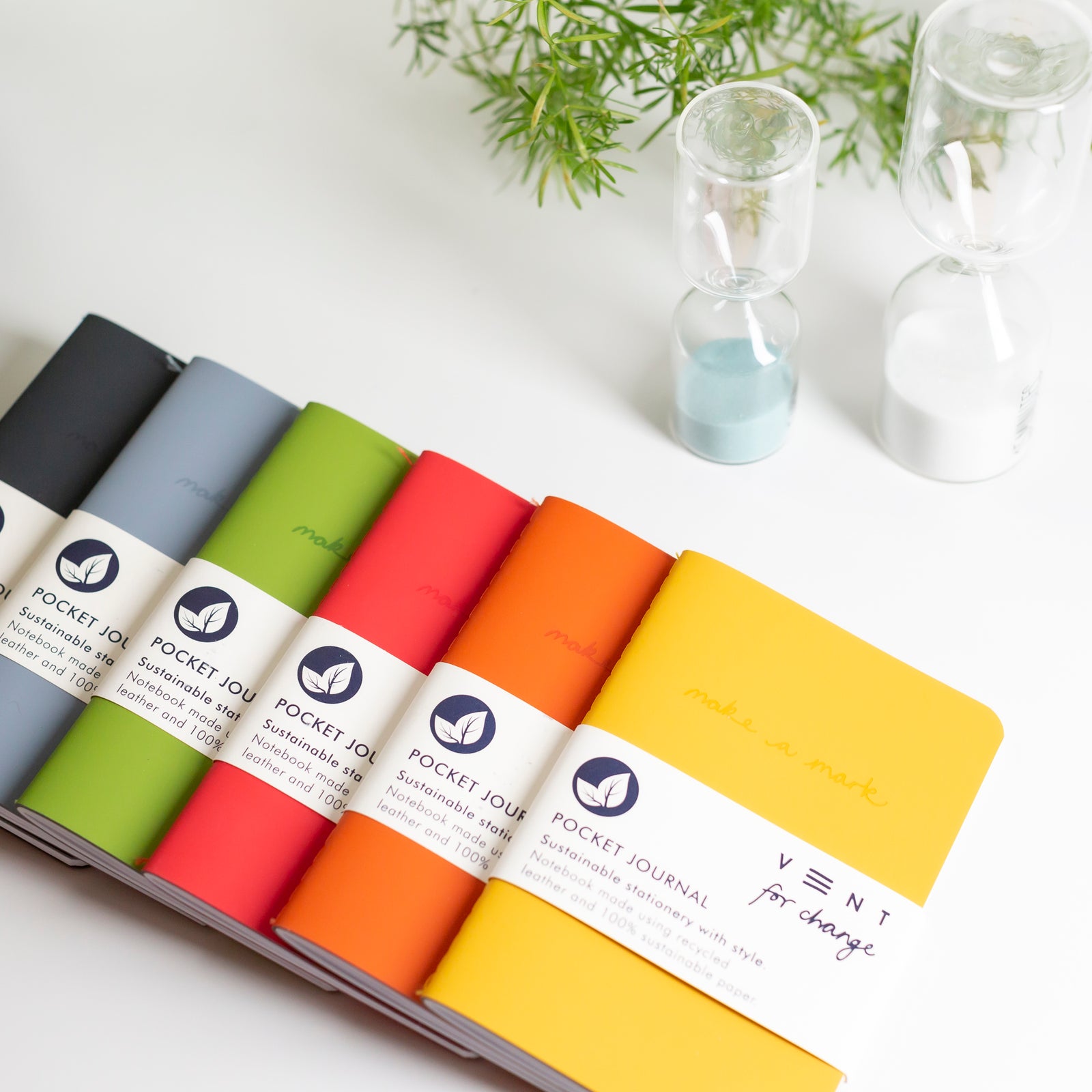 Make a Mark Recycled Leather A6 Pocket Notebook showing rainbow of colours available by Vent For Change at Penny Black