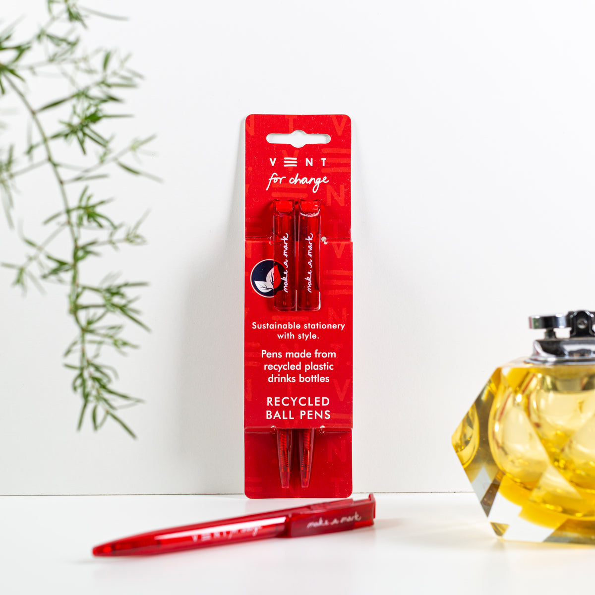 Make a Mark Recycled Pen 2 pack set by Vent for Change in it&#39;s packaging against a wall in colourway blood red