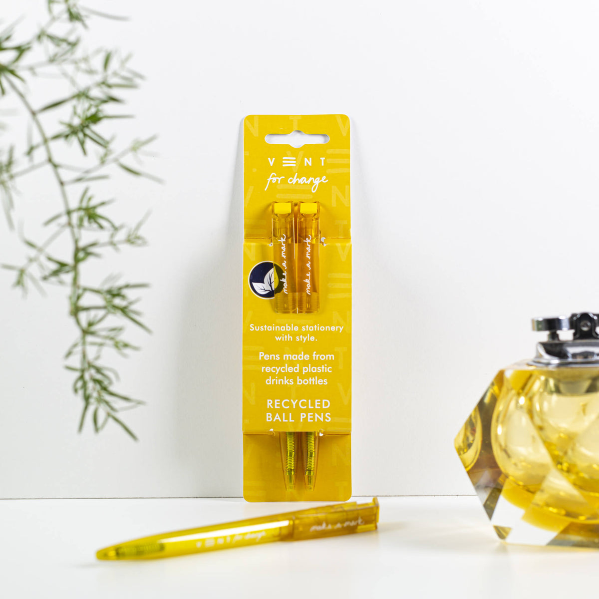 Make a Mark Recycled Pen 2 pack set by Vent for Change in it&#39;s packaging against a wall in colourway mustard yellow