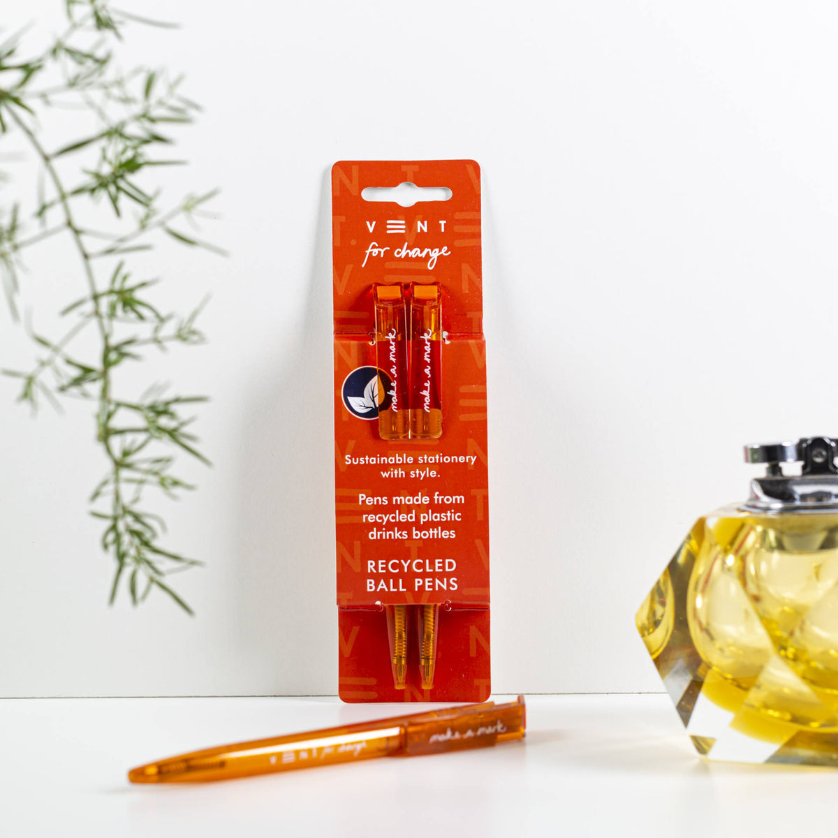 Make a Mark Recycled Pen 2 pack set by Vent for Change in it&#39;s packaging against a wall in colourway burnt orange