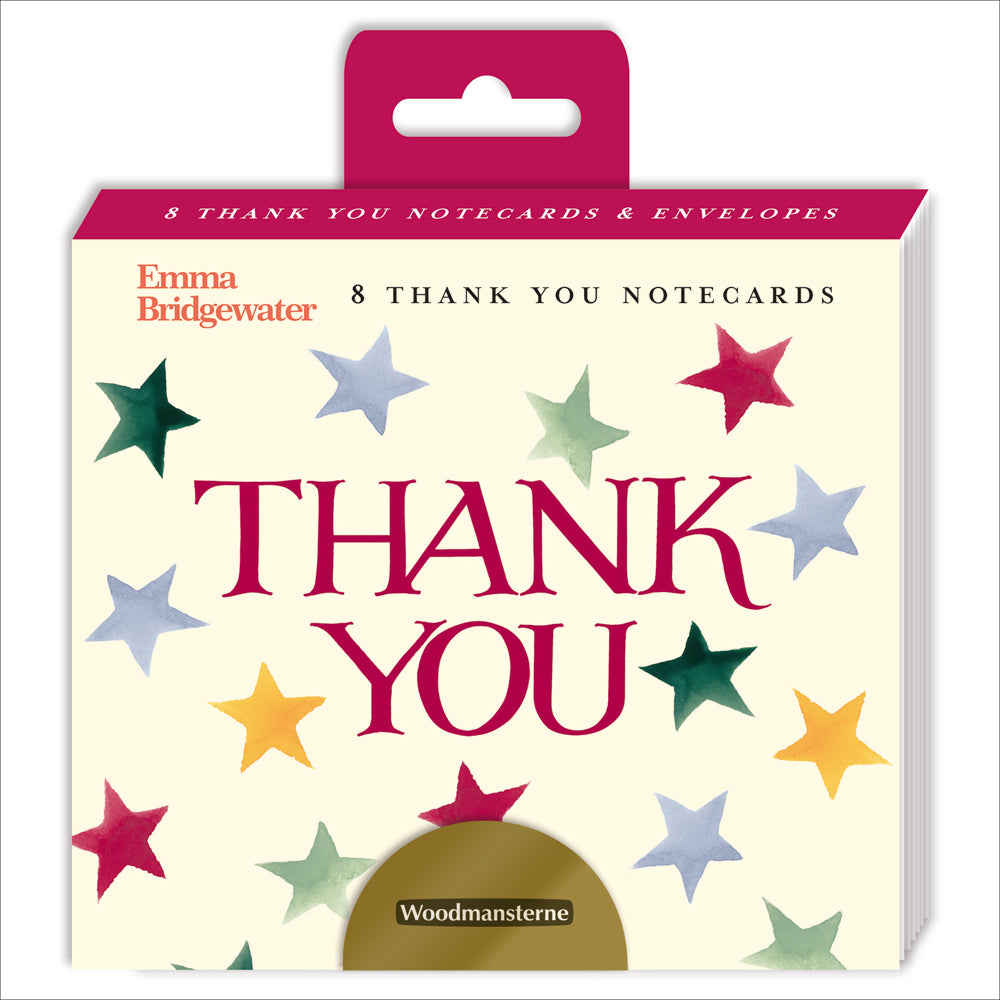 An image of a pack of 8 notecards by Woodmansterne Publishing. It shows a preview on the card design which says THANK YOU in dark pink and surrounded by colourful stars..