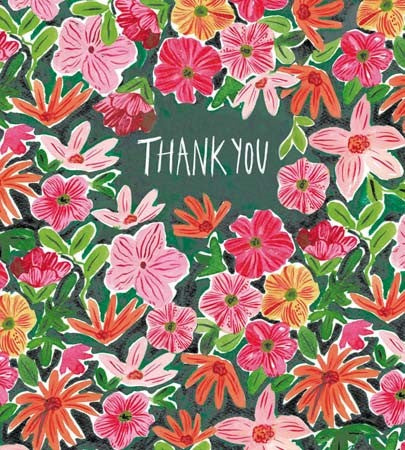 An image of a pack of 8 notecards by Woodmansterne Publishing. It shows a preview on the card design which has the words THANK YOU in white surrounded by pink, red and orange flowers.