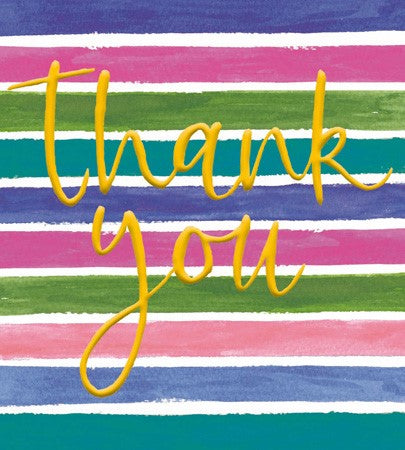 An image of a pack of 8 notecards by Woodmansterne Publishing. It shows a preview on the card design which has the words THANK YOU in gold script writing on a bakground of multicoloured stripes going horizontally.