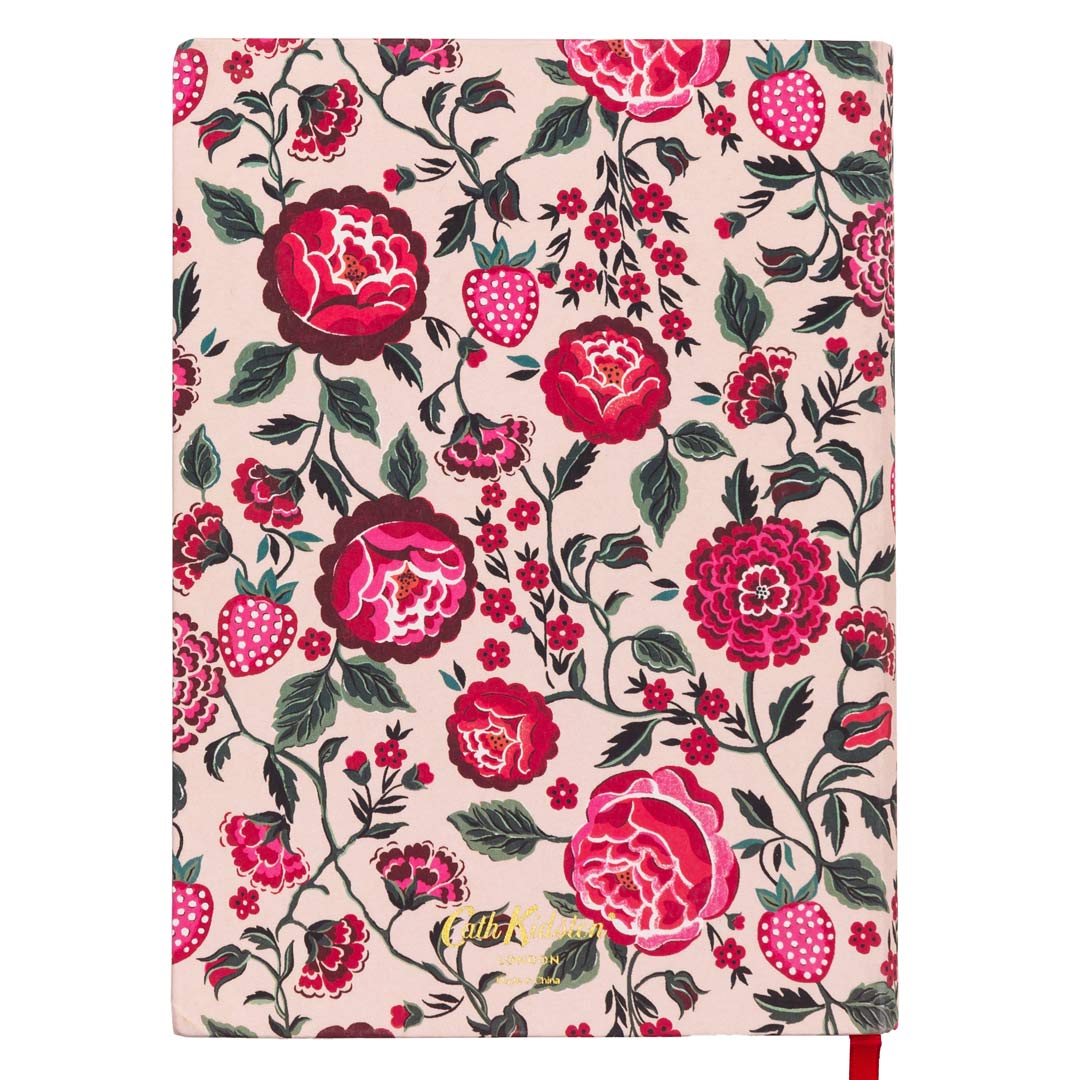 The back cover of a daily planner by Cath Kidston. The cover design has a cream background and is covered in colourful flowers and foliage in burgundy, pink and red. It also has red and pink strawberries dotted through the design. 