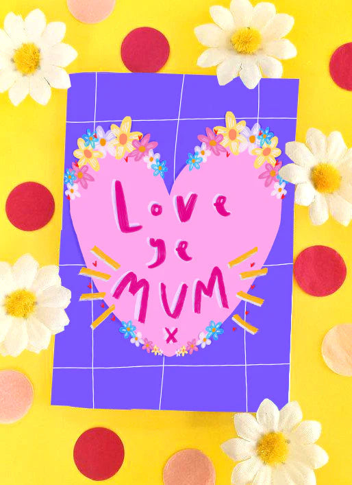A greeting card with purple background with thin checked lines featuring a large pink heard adorned with spring colour flowers and the words LOVE YE MUM x in bold cerise pink writing within the heart.