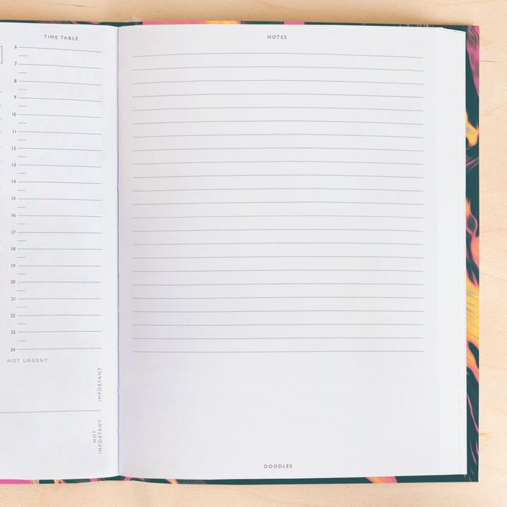 This image shows the inside of a planner, the right hand page. It is a ruled notes page until the last third, which is blank for doodles.