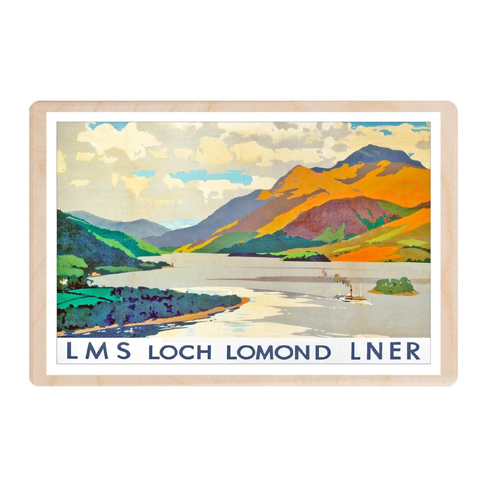This wooden postcard has a vintage travel poster scene of Loch Lomond in Scotland. It has mountains in the background and the loch with a steamer in the foreground. it has the words LMS Loch Lomond LNER at the bottom.