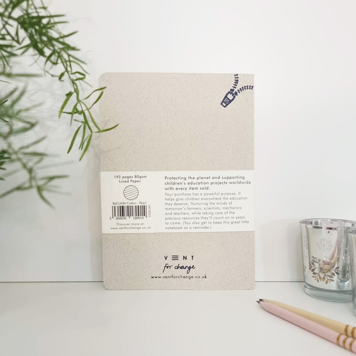 RECLAIM Recycled A5 Lined Notebook back cover in pearl coloured cotton leaning against a white background by Vent for Change at Penny Black