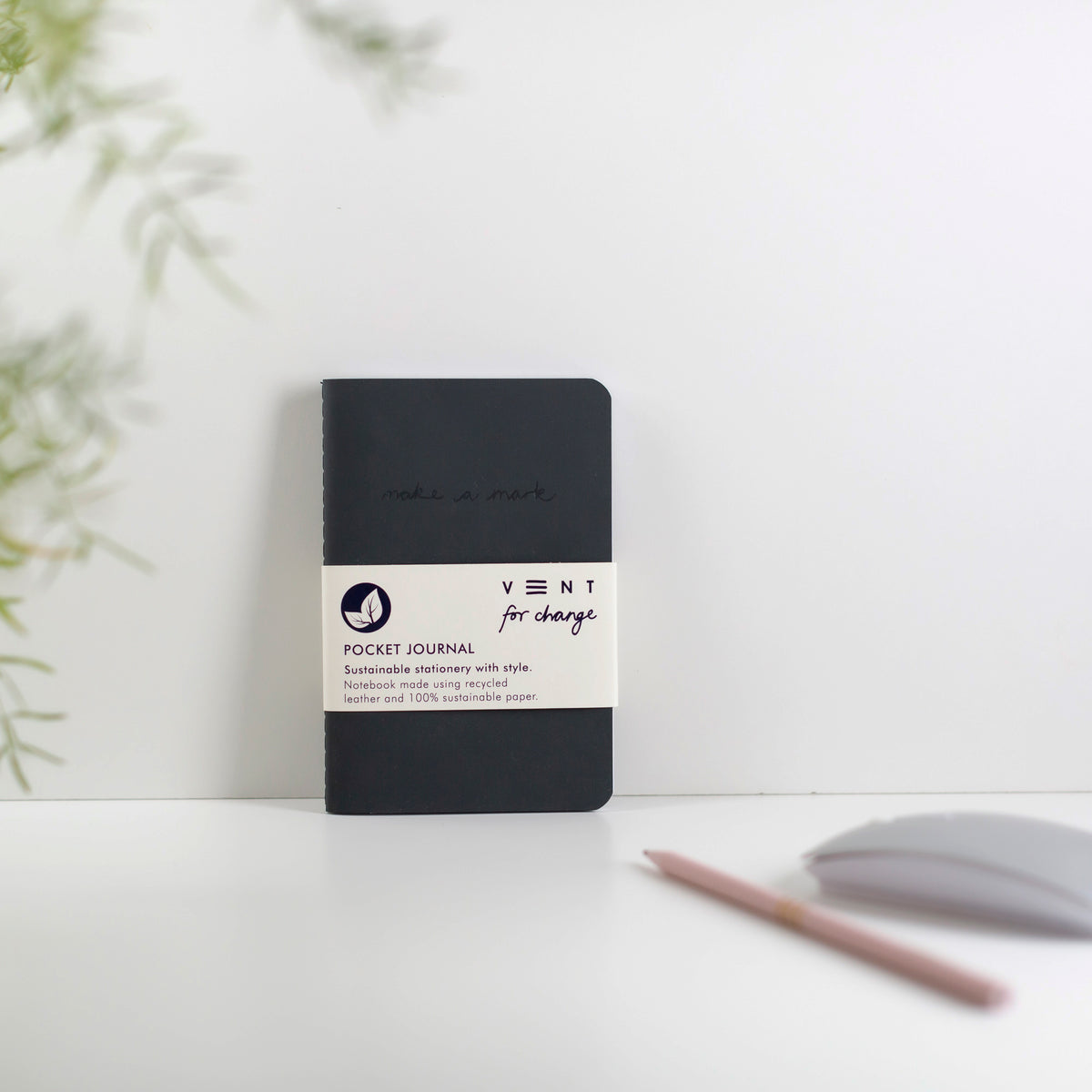 Make a Mark Recycled Leather A6 Pocket Notebook showing charcoal grey colourway leaning against a white background by Vent For Change at Penny Black