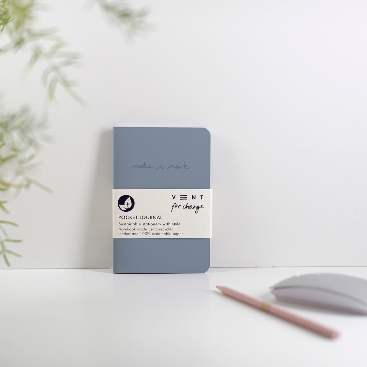 Make a Mark Recycled Leather A6 Pocket Notebook showing dusty blue colourway leaning against a white background by Vent For Change at Penny Black