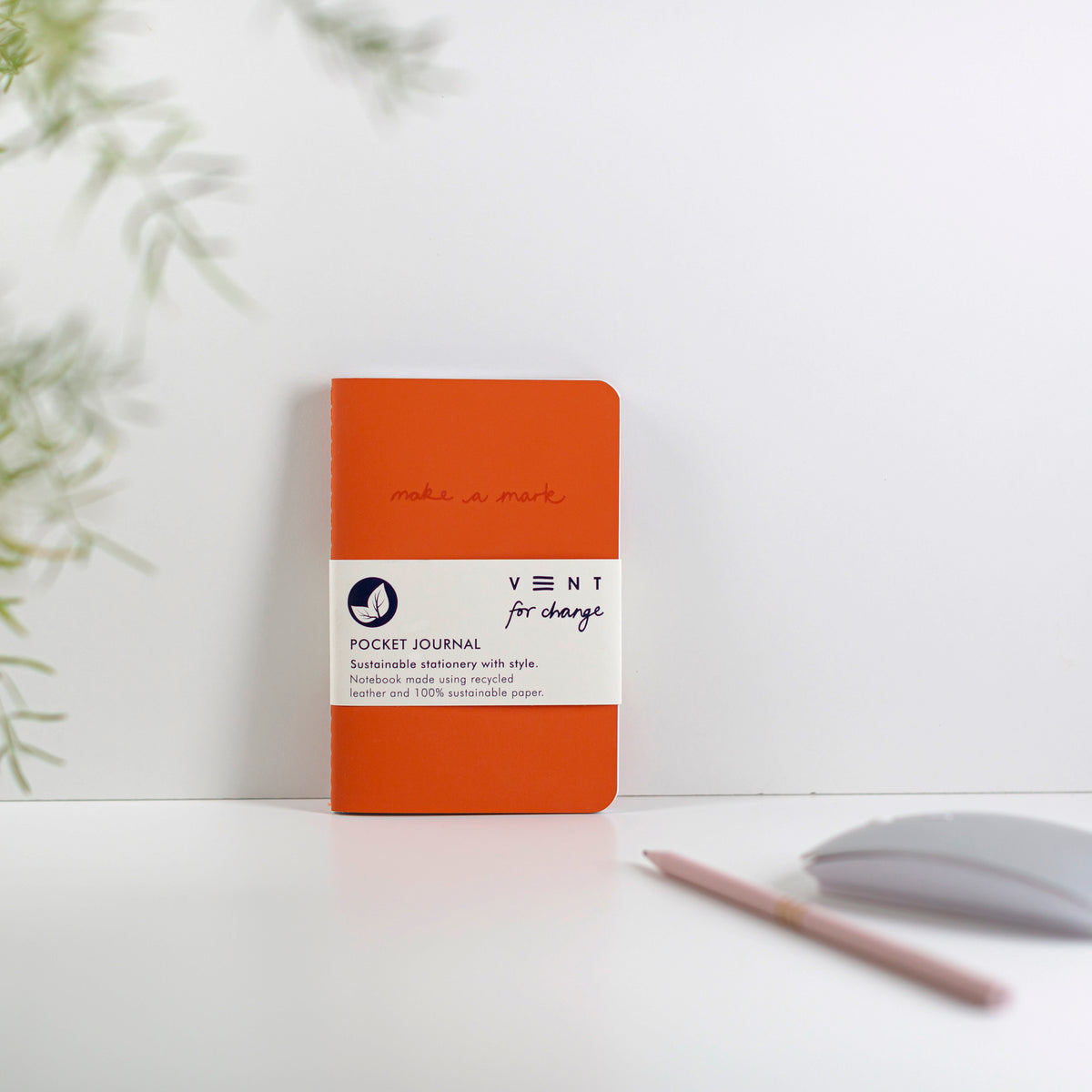 Make a Mark Recycled Leather A6 Pocket Notebook showing burnt orange colourway leaning against a white background by Vent For Change at Penny Black