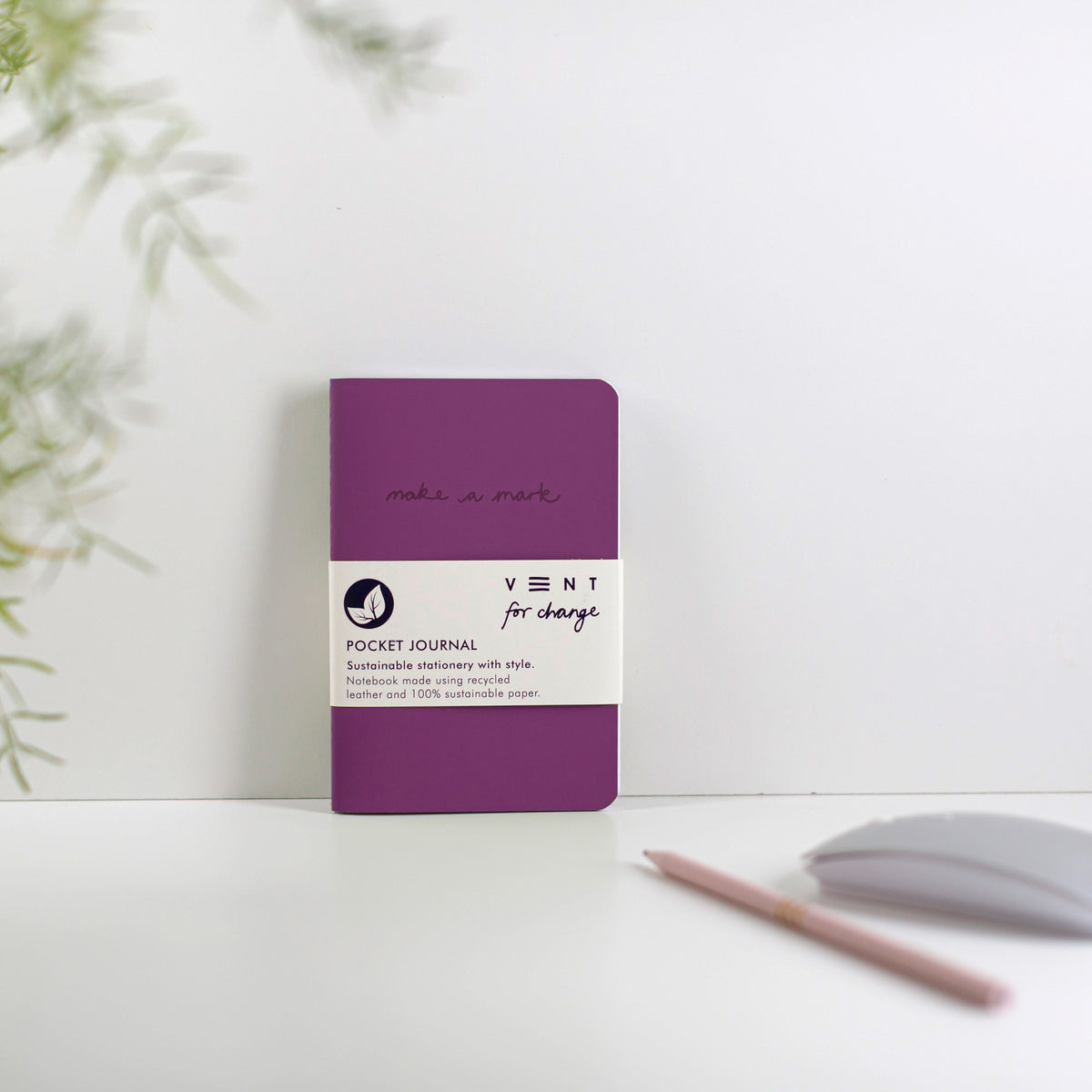 Make a Mark Recycled Leather A6 Pocket Notebook showing deep purple colourway leaning against a white background by Vent For Change at Penny Black