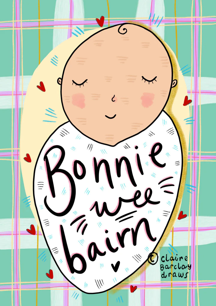 A greetings card with green and pink tartan background and a white baby swaddled in a white blanket, with wording Bonnie Wee Bairn across it.
