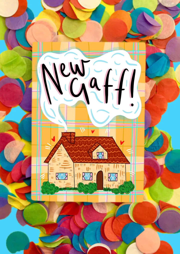 A greetings card with a yellow, pink and green tartan background, an illustration of a house with smoke coming from the chimney. In the cloud of smoke from the chimney are the words NEW GAFF.